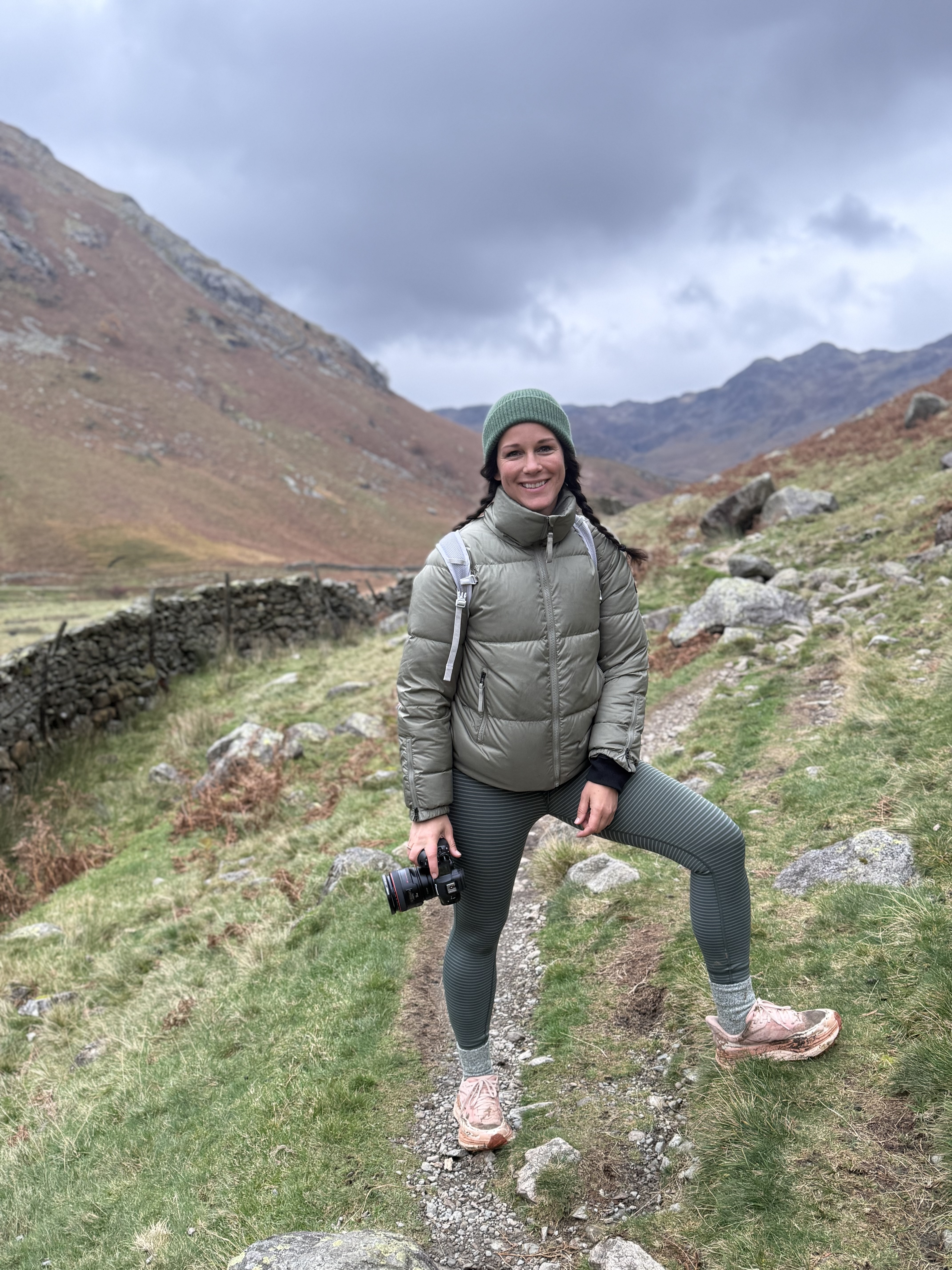 Tara hiking with her camera in the fells of the Lake District